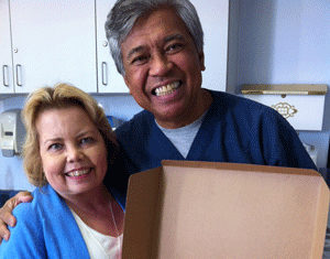 Lori Hartwell and dialysis nurse Marc Manolo, RN